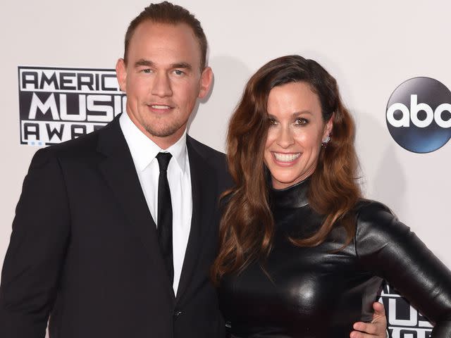 <p>C Flanigan/Getty</p> Alanis Morissette and husband Mario Treadway arrive at the 2015 American Music Awards on November 22, 2015 in Los Angeles, California.