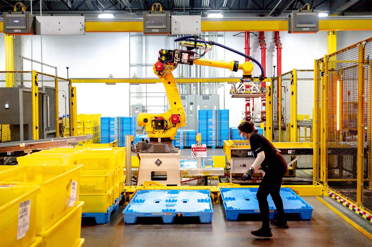 worker organizing items in a warehouse