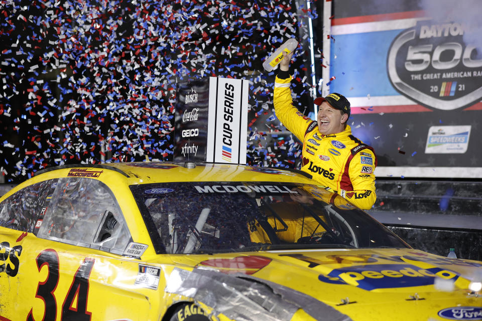 DAYTONA BEACH, FLORIDA - FEBRUARY 14: Michael McDowell, driver of the #34 Love's Travel Stops Ford, celebrates in victory lane after winning the NASCAR Cup Series 63rd Annual Daytona 500 at Daytona International Speedway on February 14, 2021 in Daytona Beach, Florida. (Photo by Jared C. Tilton/Getty Images)