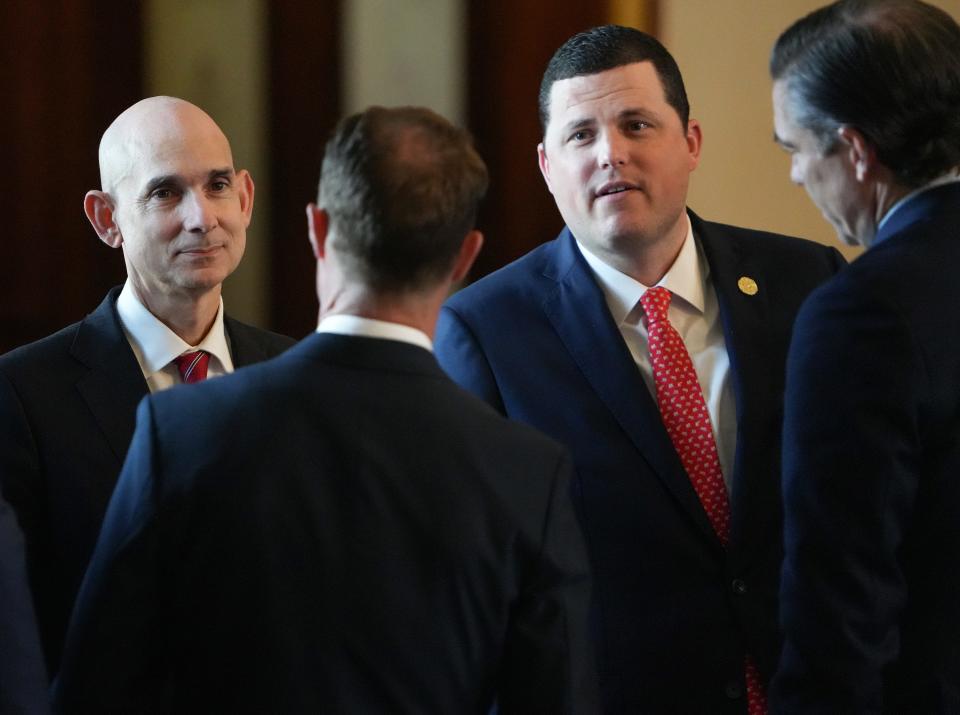 Republican state Rep. Jared Patterson, right, supported the speaker's call to give Defend Texas Liberty PAC donations to charity, saying he showed "great leadership."