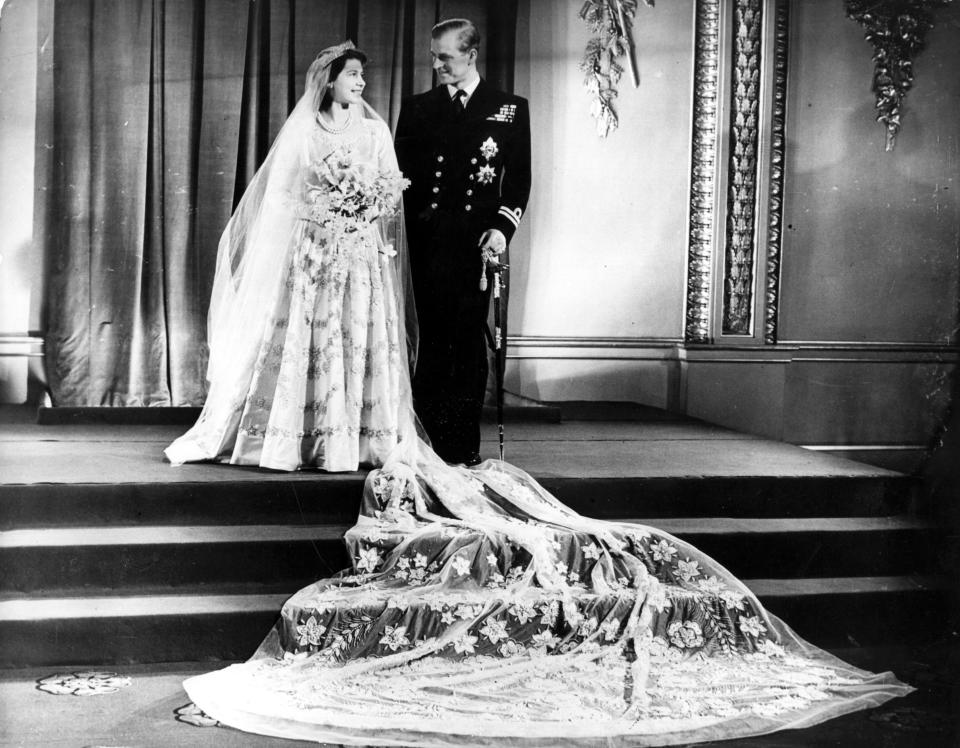 The Queen, then Princess Elizabeth, married Prince Philip in a custom design by Norman Hartnell in November 1947. (Getty Images)