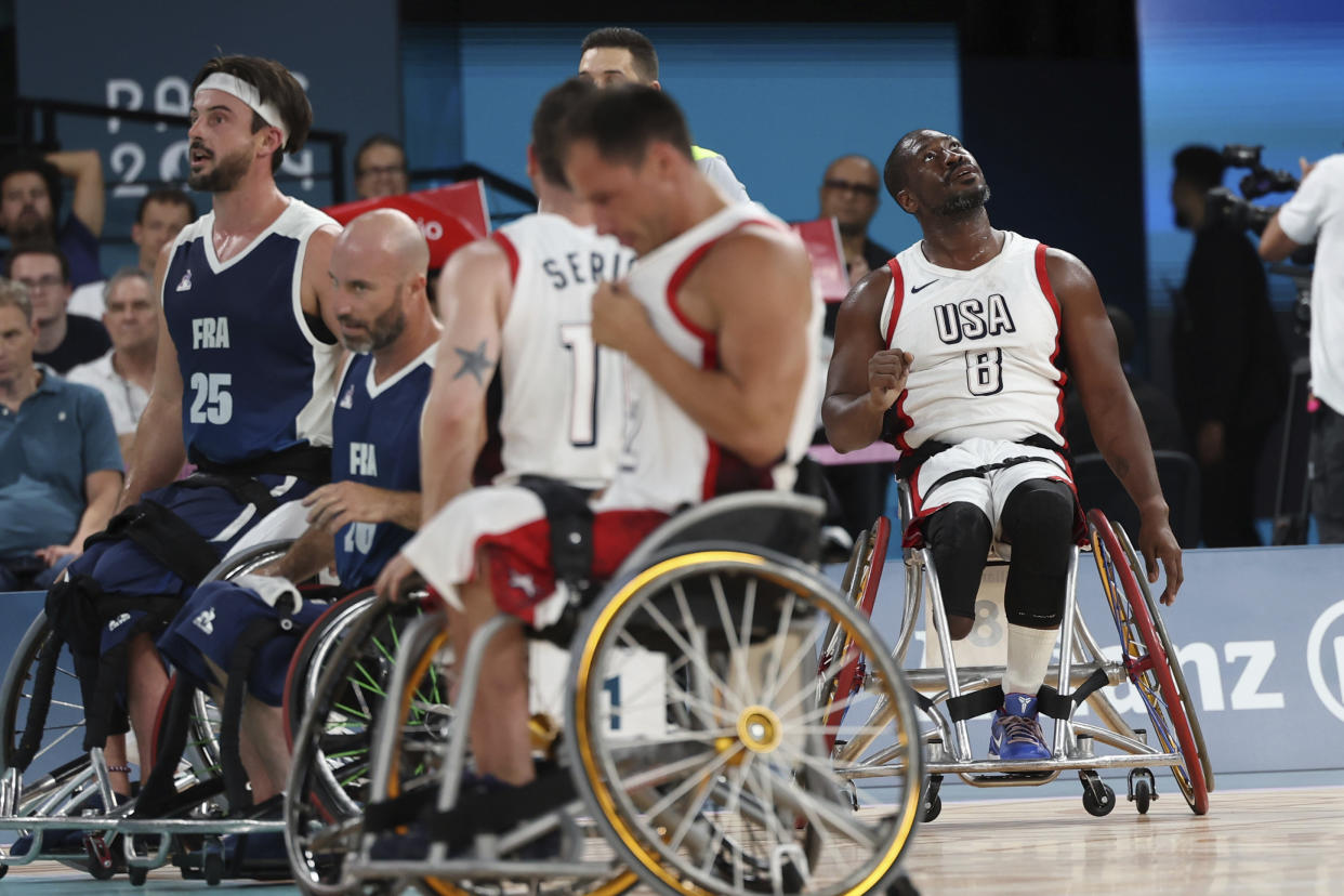 United States' Brian Bell looks up at the scoreboard during a men's wheelchair basketball quarterfinal game versus France, at Bercy Arena, during the 2024 Paralympics on Tuesday, Sept. 3, 2024, in Paris, France. (AP Photo/Aidan Conrad)