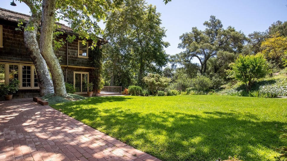 The backyard lawn of the Pasadena home. - Credit: Redfin