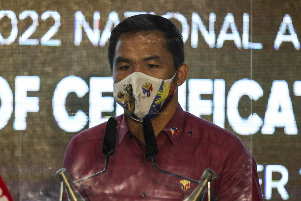 Retired Filipino boxing star and senator Manny Pacquiao speaks to reporters after filing his certificate of candidacy for next year's presidential elections before the Commission on Elections at the Sofitel Harbor Garden Tent in Manila, Philippines on Friday, Oct. 1, 2021. Friday marks the start of a weeklong registration period for candidates seeking to lead a Southeast Asian nation that has been hit hard by the pandemic and deep political conflicts.(Jam Sta Rosa/Pool Photo via AP)