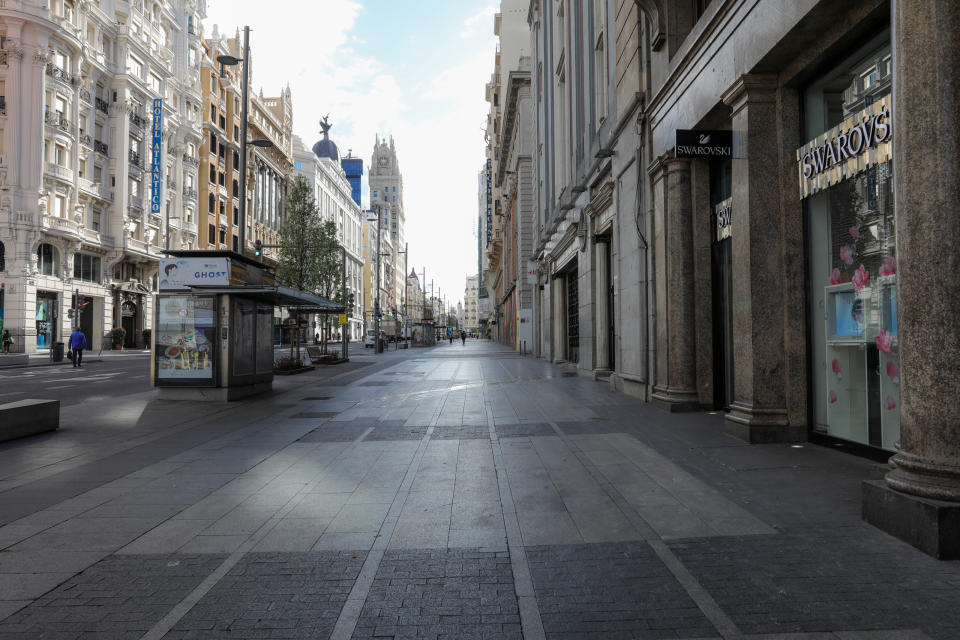 MADRID, SPAIN - MARCH 16: Gran Via Street of Madrid is seen empty on the third day of the state of alarm, announced on Friday 13th and implemented on Saturday 14th, due to the coronavirus outbreak, on March 16, 2020 in Madrid, Spain. (Photo by Jesus Hellin/Europa Getty Images)  (Photo by Europa Press News/Europa Press via Getty Images)