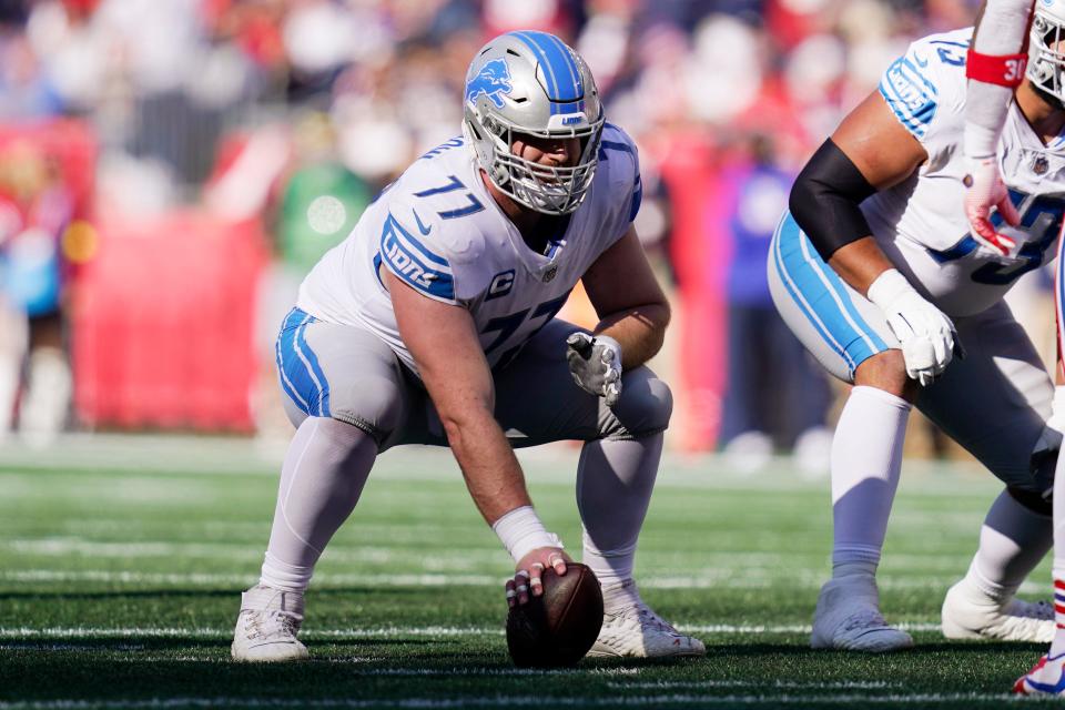 Lions center Frank Ragnow (77) gets ready to snap vs. the Patriots on Sunday, Oct. 9, 2022, in Foxborough, Mass.