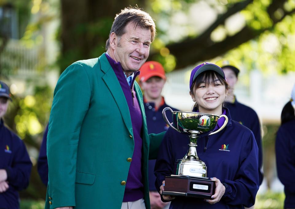 Girls 14-15 winner Martha Kuwahara with former Masters champion Nick Faldo on Sunday at the Drive, Chip and Putt finals.