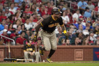San Diego Padres' Tommy Pham runs to first on an RBI single during the fourth inning of a baseball game against the St. Louis Cardinals Saturday, Sept. 18, 2021, in St. Louis. (AP Photo/Jeff Roberson)