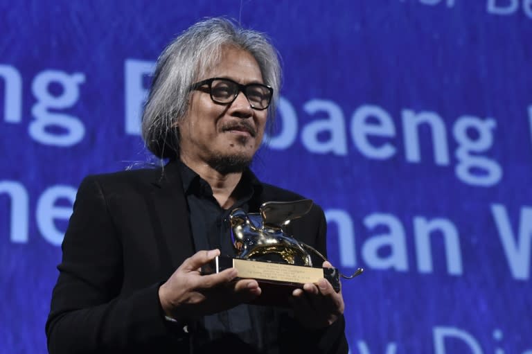 Director Lav Diaz holds the Golden Lion award for Best Film for the movie "The Woman Who Left" during the awards ceremony of the 73rd Venice Film Festival on September 10, 2016