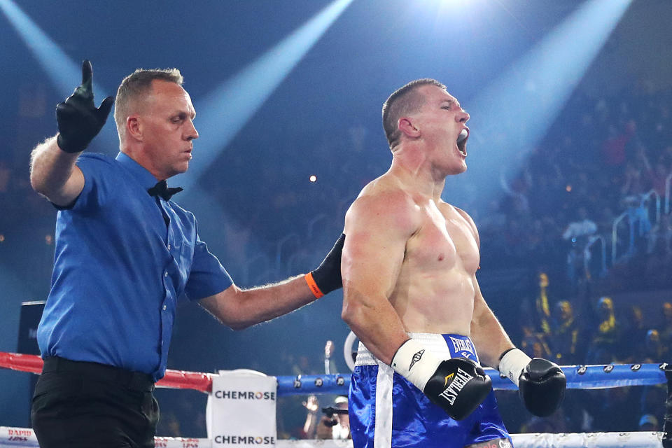 Paul Gallen (pictured right) celebrates defeating Lucas Browne by TKO during their bout at WIN Entertainment Centre on April 21, 2021 in Wollongong, Australia.