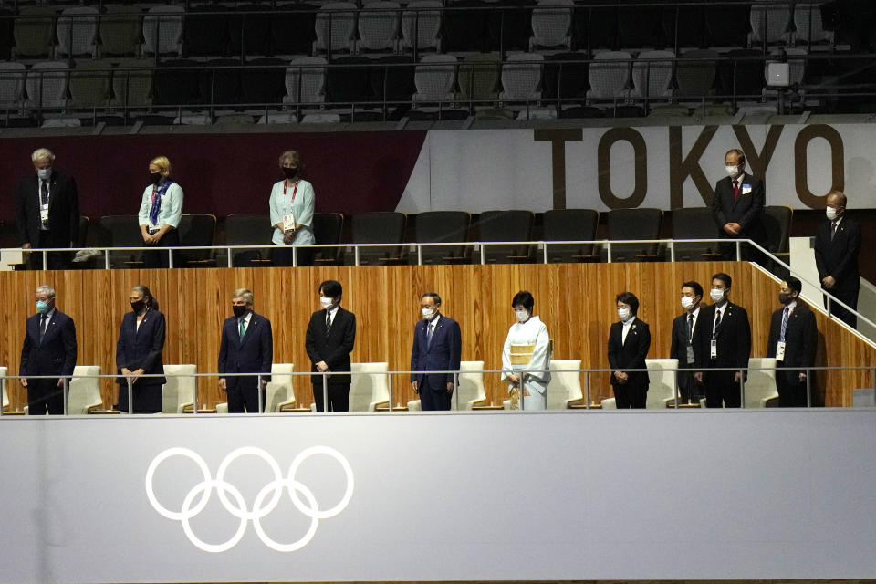 International Olympic Committee's President Thomas Bach, third from left, Japan's Crown Prince Akishino, fourth from left, and Japan's Prime Minister Yoshihide Suga attend the closing ceremony in the Olympic Stadium at the 2020 Summer Olympics, Sunday, Aug. 8, 2021, in Tokyo, Japan. (AP Photo/Hassan Ammar)