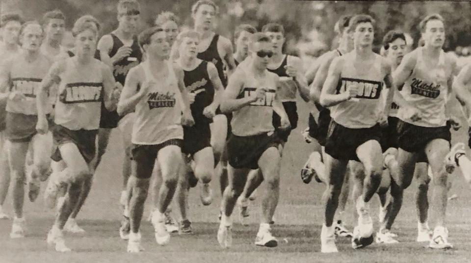 Watertown runners, from left, Brad Goldhorn, Nathan Schmidt, Chris Larson and Shane Liebl compete in a Watertown Invitational cross country meet in the early 1990s.