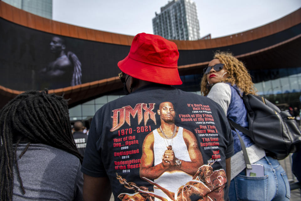 People gather for a "Celebration of Life Memorial" for rapper DMX at Barclays Center, Saturday, April. 24, 2021, in the Brooklyn borough of New York. DMX, whose birth name is Earl Simmons, died April 9 after suffering a "catastrophic cardiac arrest." (AP Photo/Brittainy Newman)