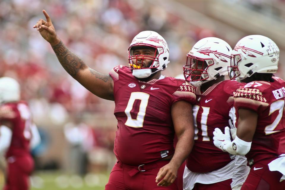 Florida State defensive tackle Fabien Lovett (0) celebrates a tackles for a loss in the second quarter of an NCAA college football game against Georgia Tech, Saturday, Oct. 29, 2022, in Tallahassee, Fla. (AP Photo/Phil Sears)