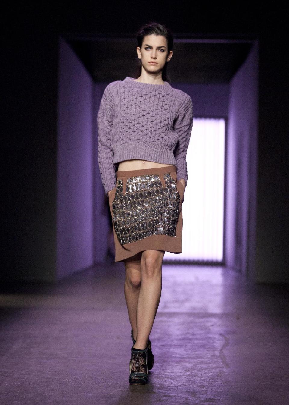 A model walks the runway during the Rebecca Taylor Fall 2013 fashion show during Fashion Week, Saturday, Feb. 9, 2013, in New York. (AP Photo/Karly Domb Sadof)