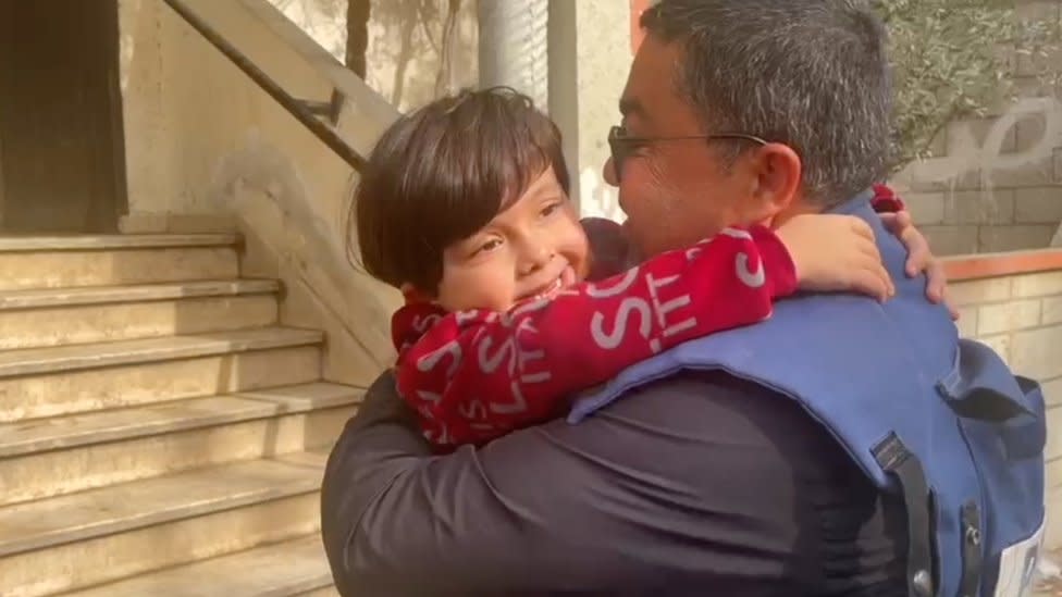 Adnan El-Bursh with his daughter Razan after he travels to Nuseirat to move his family to Rafah