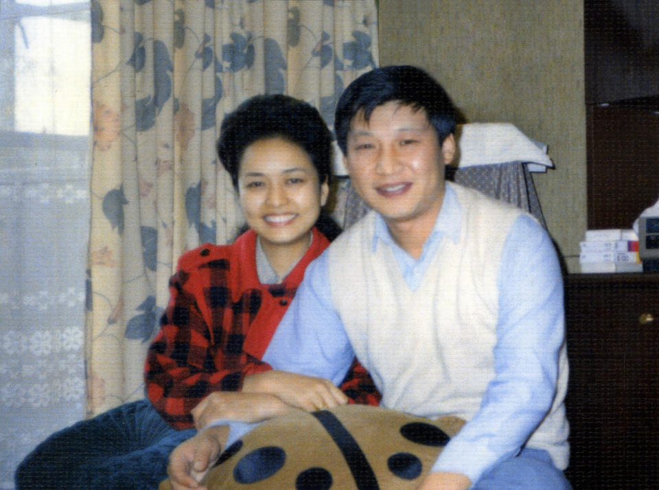 FILE - This photo provided by China's Xinhua News Agency, shows Communist Party Leader Xi Jinping and his wife Peng Liyuan in September 1989. When Xi Jinping came to power in 2012, it wasn't clear what kind of leader he would be. His low-key persona during a steady rise through the ranks of the Communist Party gave no hint that he would evolve into one of modern China's most dominant leaders, or that he would put the economically and militarily ascendant country on a collision course with the U.S.-led international order. (Xinhua via AP, File)