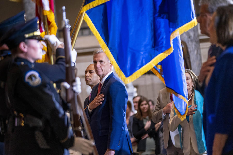 House Speaker Kevin McCarthy of Calif., center, House Minority Leader Hakeem Jeffries of N.Y., left., and Rep. Nancy Pelosi, D-Calif, right, attend an unveiling ceremony for the Congressional statue of Willa Cather, in Statuary Hall on Capitol Hill in Washington, Wednesday, June 7, 2023. Willa Cather was one of the country's most beloved authors, writing about the Great Plains and the spirit of America. (AP Photo/Andrew Harnik)