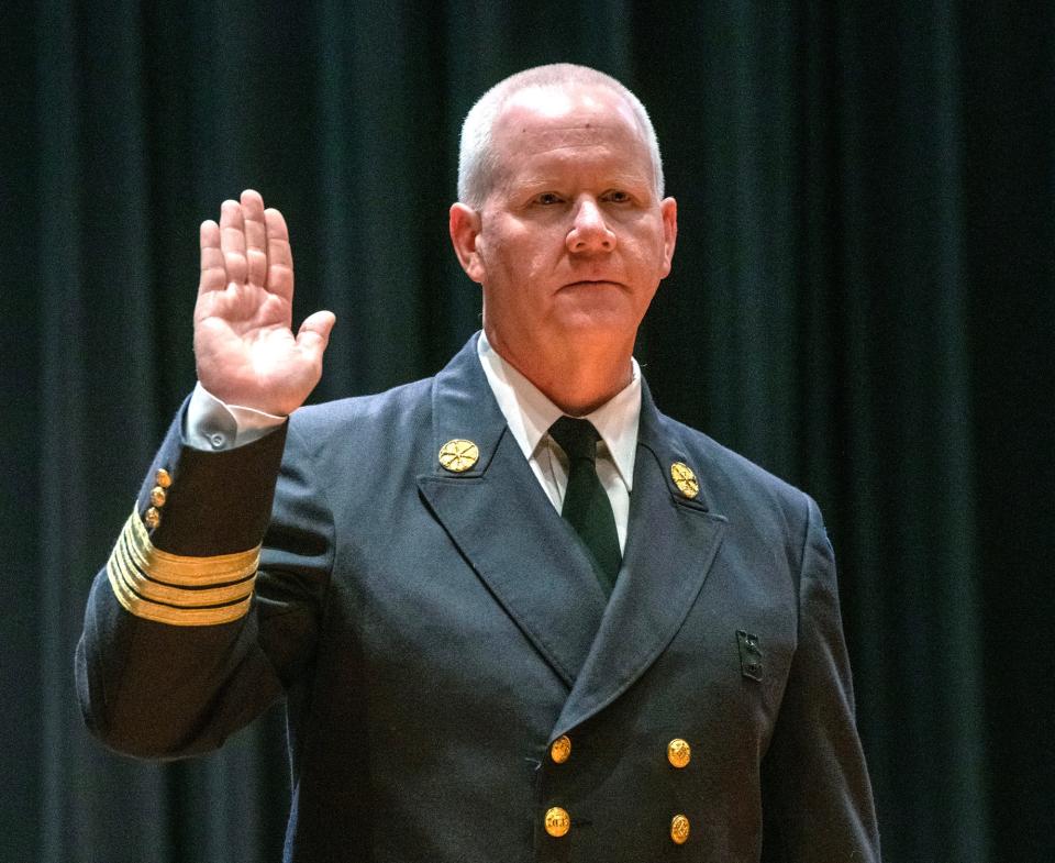 Martin Dyer is sworn in as chief of the Worcester Fire Department during a ceremony Thursday afternoon at Worcester Technical High School.