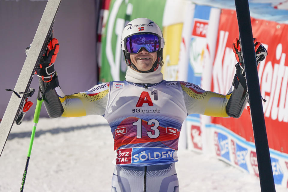 Norway's Lucas Braathen celebrates in the finish area after completing alpine ski, men's World Cup giant slalom in Soelden, Austria, Sunday, Oct. 18, 2020.. (AP Photo/Giovanni Auletta)