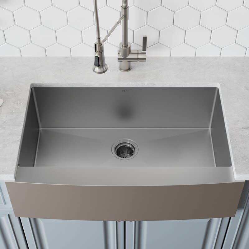 Farmhouse/Apron Kitchen Sink with Basket Strainer. Image via Wayfair.