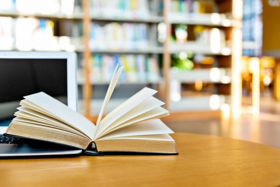 book open on a library table