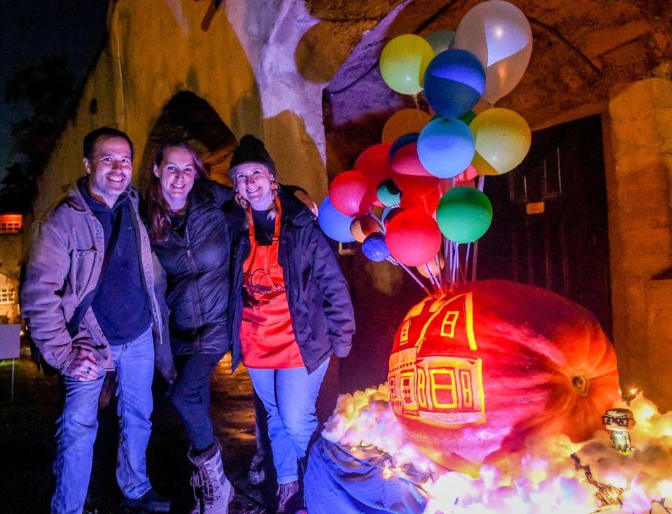 Hundreds lined up to get a view of gigantic carved pumpkins beneath the historic arches of the Bucks County Tile Works Oct. 23 during the 2021 Pumpkinfest.