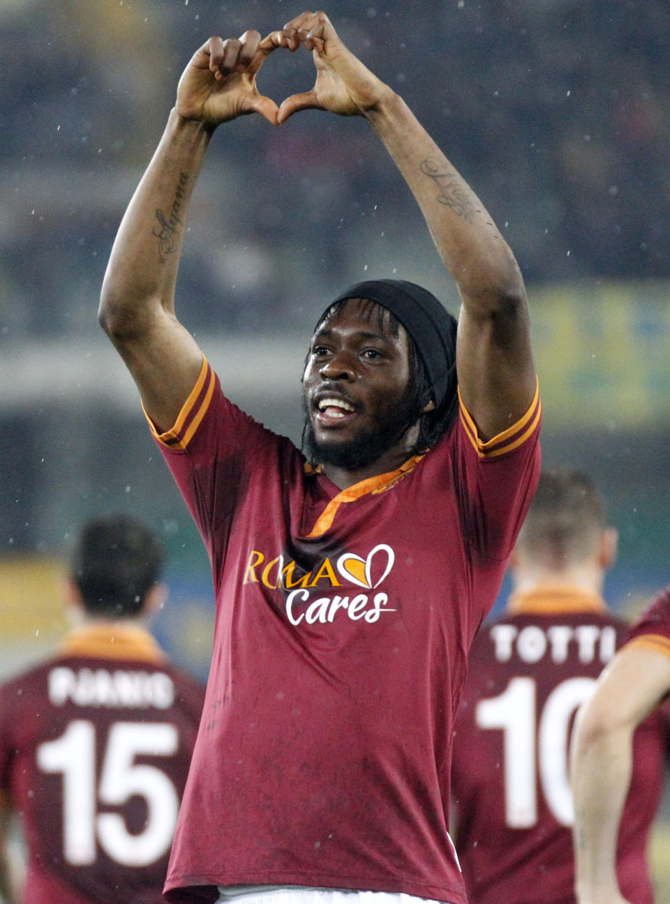 AS Roma forward Gervinho, of Ivory Coast, celebrates after scoring during a Serie A soccer match against Chievo at Bentegodi stadium in Verona, Italy, Saturday, March 22, 2014. (AP Photo/Felice Calabro')