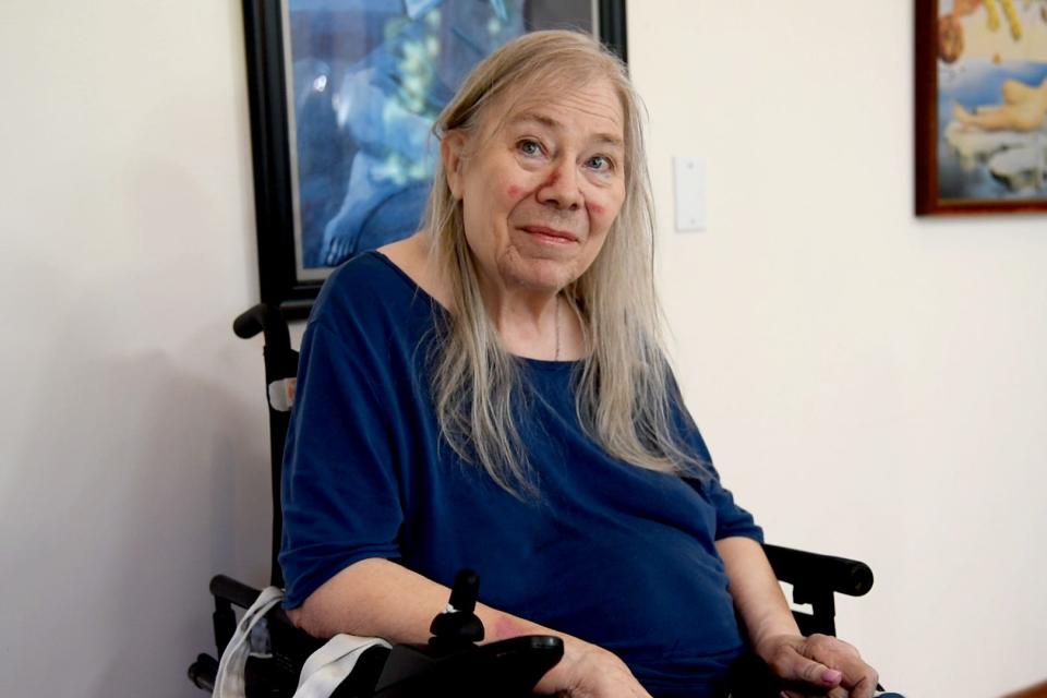 Carolyn Schwebel poses for a photo at her home on Saturday, October 15, 2022 in Middletown, New Jersey. Schwebel was the chair of the township’s Human Rights Commission and had successfully sued the township to create a transition plan that would make municipality facilities comply with the Americans with Disabilities Act. 