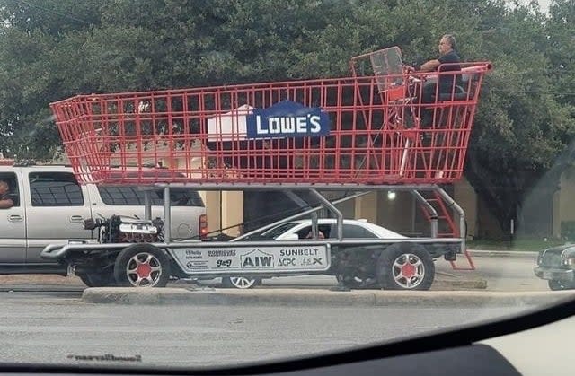 someone driving a shopping cart that's bigger than an SUV