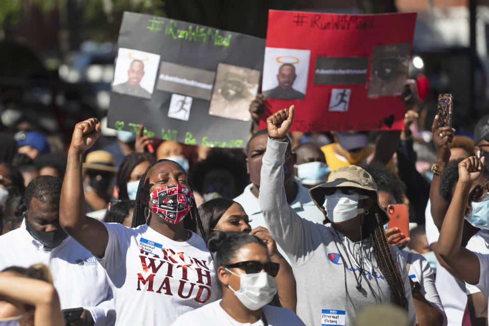 People react during a rally to protest the shooting of an unarmed black man, Friday, May 8, 2020, in Brunswick Ga. Two men have been charged with murder in the February shooting death of Ahmaud Arbery, whom they had pursued in a truck after spotting him running in their neighborhood. (AP Photo/John Bazemore)