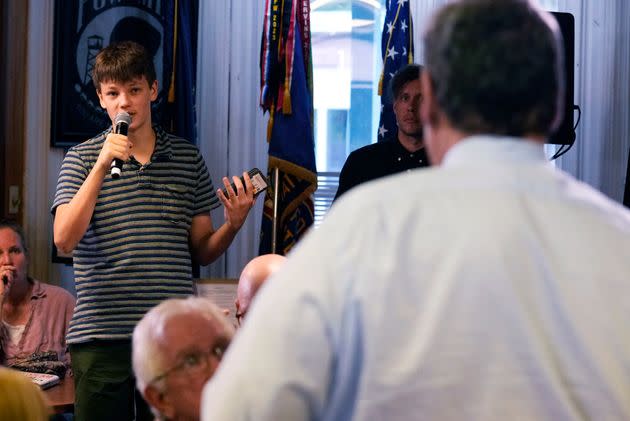 Quinn Mitchell is seen asking former New Jersey Gov. Chris Christie a question during a July 24, 2023 campaign event. In a new interview, he told HuffPost about getting ejected from a New Hampshire GOP event.