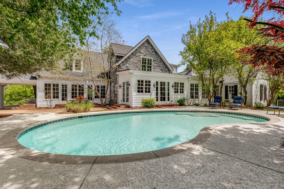 Trisha Yearwood has listed her Brentwood home for sale. This photo shows the backyard pool.