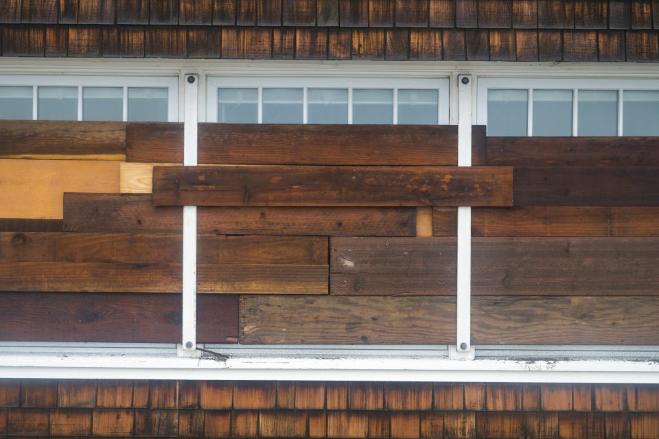 A boarded up house during storms on Beach Drive in Aptos, Calif., Monday, Jan. 9, 2023. (AP Photo/Nic Coury)