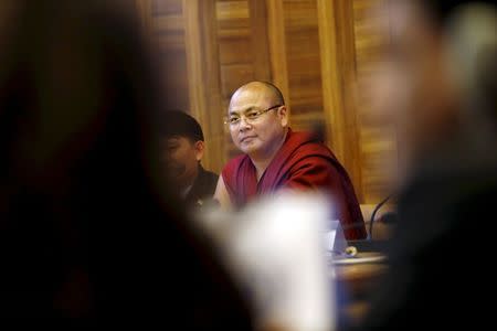 Former political prisoner Tibetan monk Golog Jigme speaks during a side event at the UN Human Rights Council in Geneva, Switzerland in this June 15, 2015 file photo. REUTERS/Pierre Albouy/Files