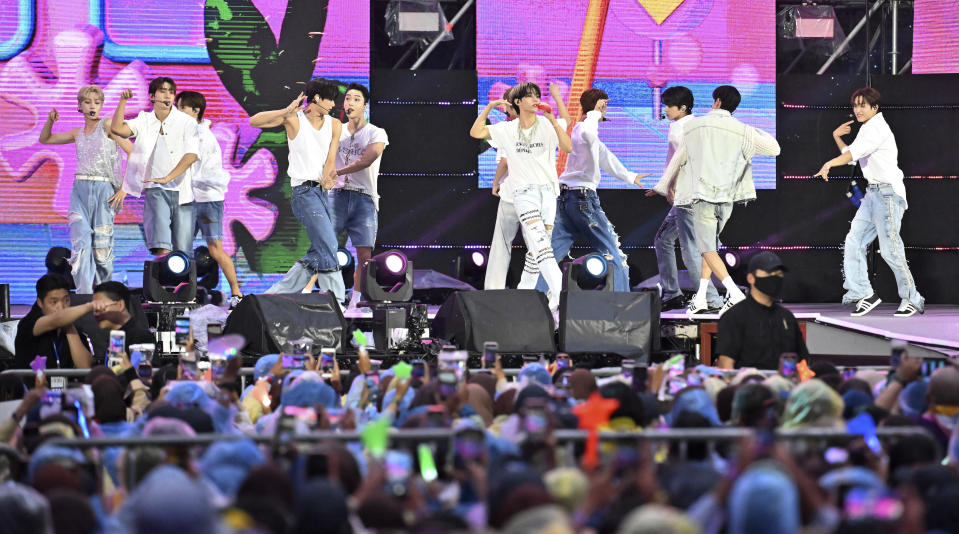 K-pop group The Boyz performs during a K-Pop concert after the closing ceremony of the World Scout Jamboree at the World Cup Stadium in Seoul, South Korea, Friday, Aug. 11, 2023. Flights and trains resumed and power was mostly restored Friday after a tropical storm blew through South Korea, which was preparing a pop concert for 40,000 Scouts whose global Jamboree was disrupted by the weather. (Korea Pool via AP)