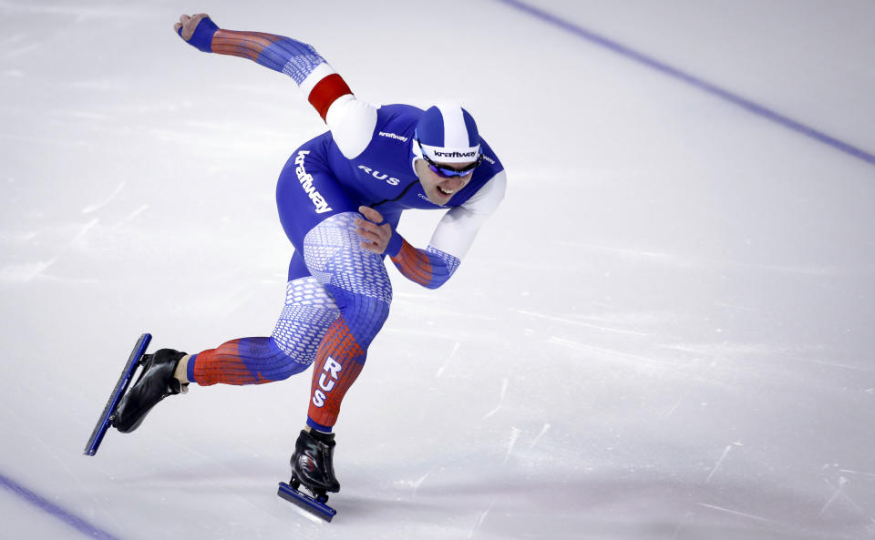 Russia's Viktor Mushtakov skates during the men's 500-meter competition at the ISU World Cup speedskating event in Calgary, Alberta, Sunday, Dec. 12, 2021. (Jeff McIntosh/The Canadian Press via AP)