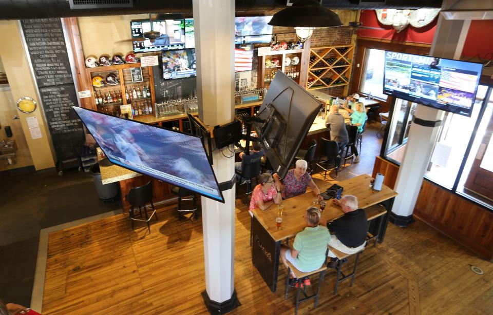 The Grocery Brewpub on University Blvd. cut their ribbon, celebrating their grand opening Thursday, May 20, 2021. [Staff Photo/Gary Cosby Jr.]