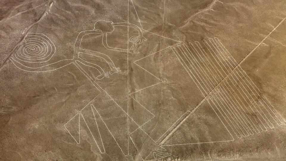 Aerial photo of Nazca lines in Peru. These lines look like a monkey.