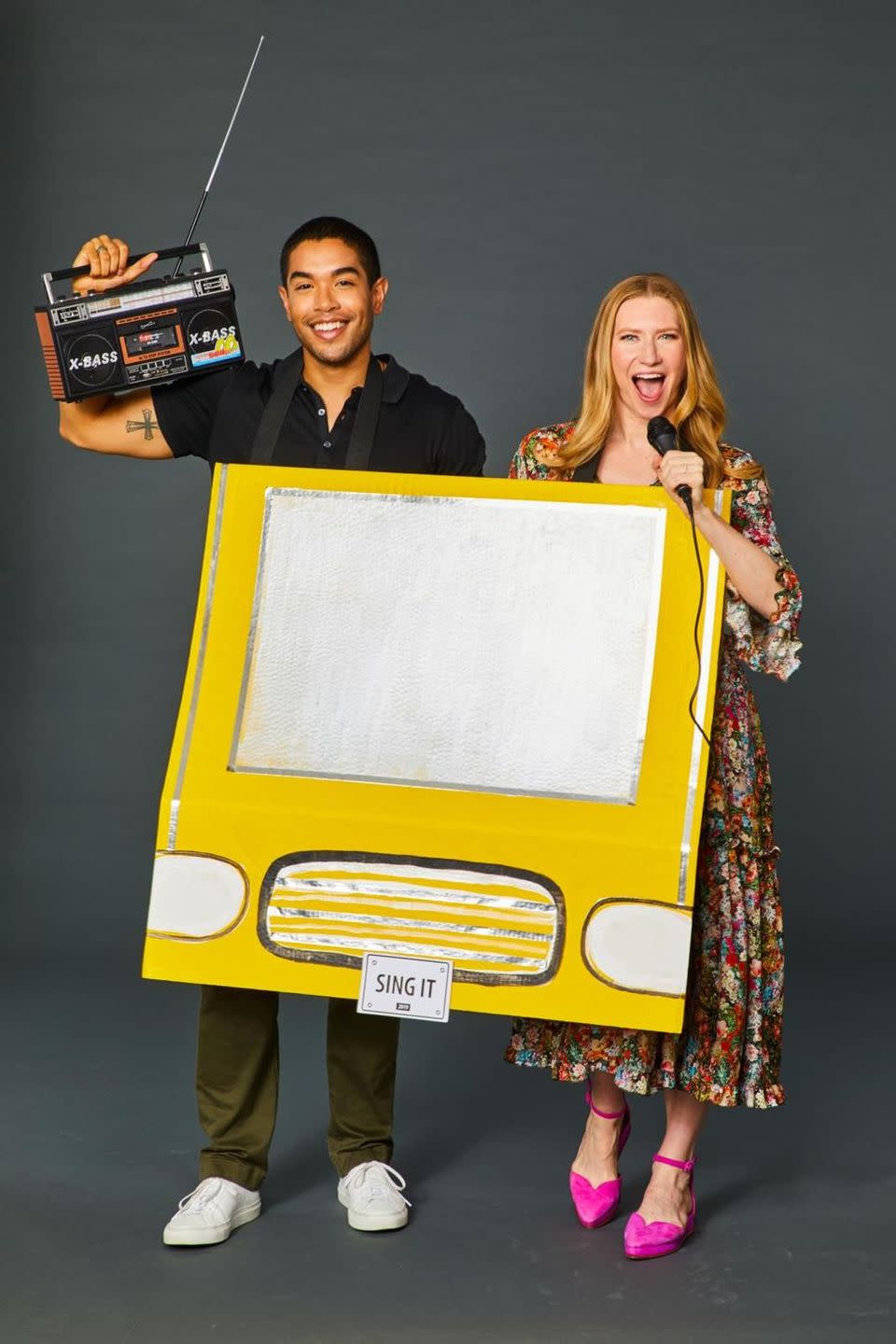 <p>If anyone's ever questioned your karaoke skills, let this clever costume showcase just how talented you two are. Add silver and black paint to a yellow presentation board to resemble a taxi, then attach velcro straps. Loop the straps over your shoulders, grab your mics and work your way through your playlist.</p>