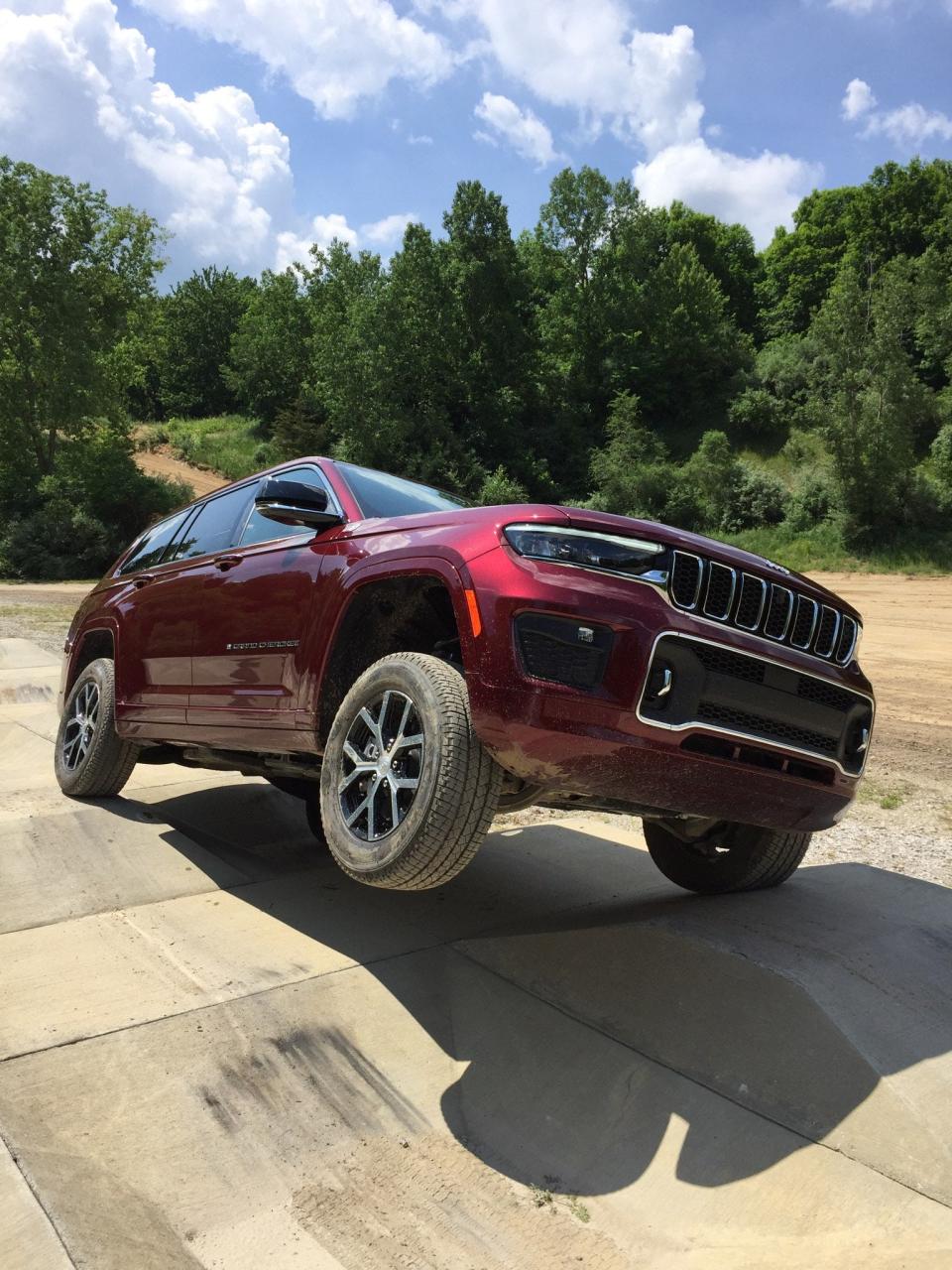 The 2021 Jeep Grand Cherokee L negotiates "camel humps" with 14-inch dips and rises at the Stellantis proving ground in Chelsea, Michigan.