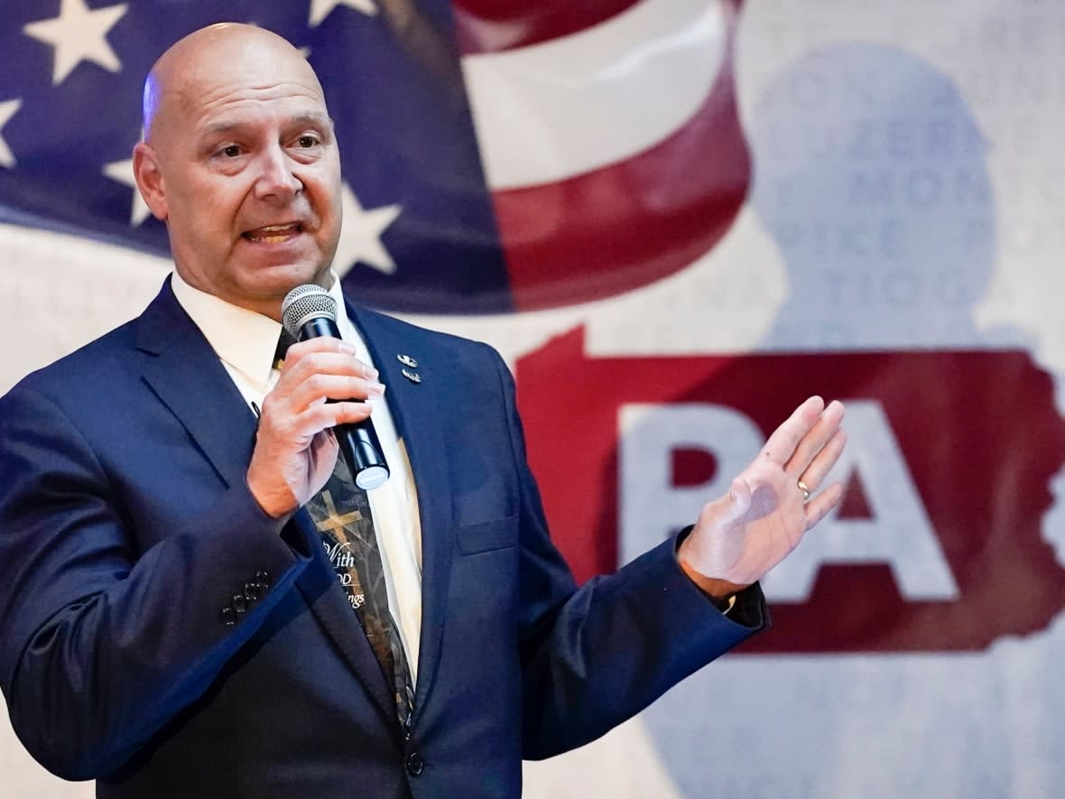 Doug Mastriano, a Pennsylvania state senator seen at a May appearance, received a doctorate from the University of New Brunswick in 2013. (Carolyn Kaster/The Associated Press - image credit)