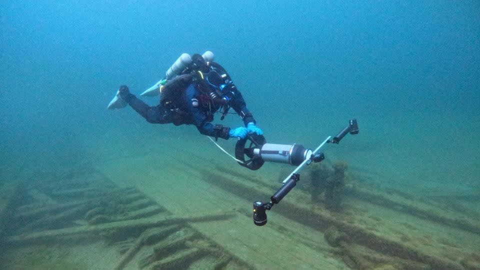 A diver from the Wisconsin Historical Society collects photos for a 3D photogrammetry model of the Muir. - Tamara Thomsen, Wisconsin Historical Society