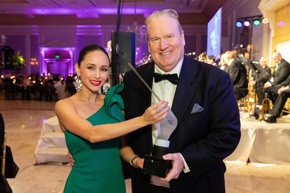 Milly and Patrick Park, seen here receiving the Palm Beach Symphony's Golden Baton Award, are chairing its 2023 gala.