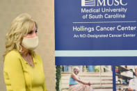 First Lady Jill Biden listens during a presentation on health disparities during a tour of the MUSC Hollings Cancer Center on Monday, Oct. 25, 2021, in Charleston, S.C. (AP Photo/Meg Kinnard)