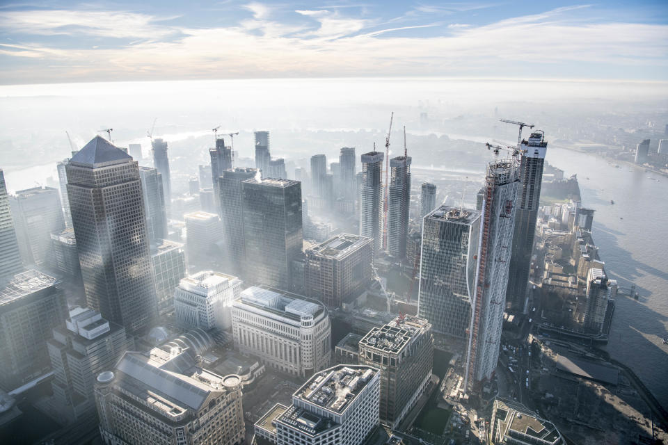 Dawn over Canary Wharf. (Photo: Jason Hawkes/Caters News)