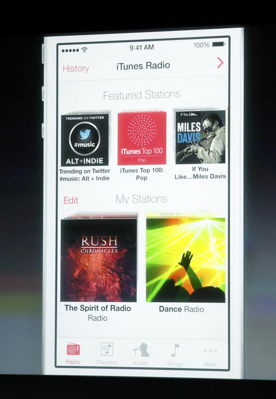 A screenshot of the new iTunes Radio is shown on screen during Apple Inc's media event in Cupertino, California September 10, 2013. (REUTERS/Stephen Lam)