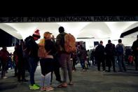 Migrants from Cuba block the Paso del Norte border crossing bridge after a U.S. appeals court blocked the Migrant Protection Protocols (MPP) program, in Ciudad Juarez