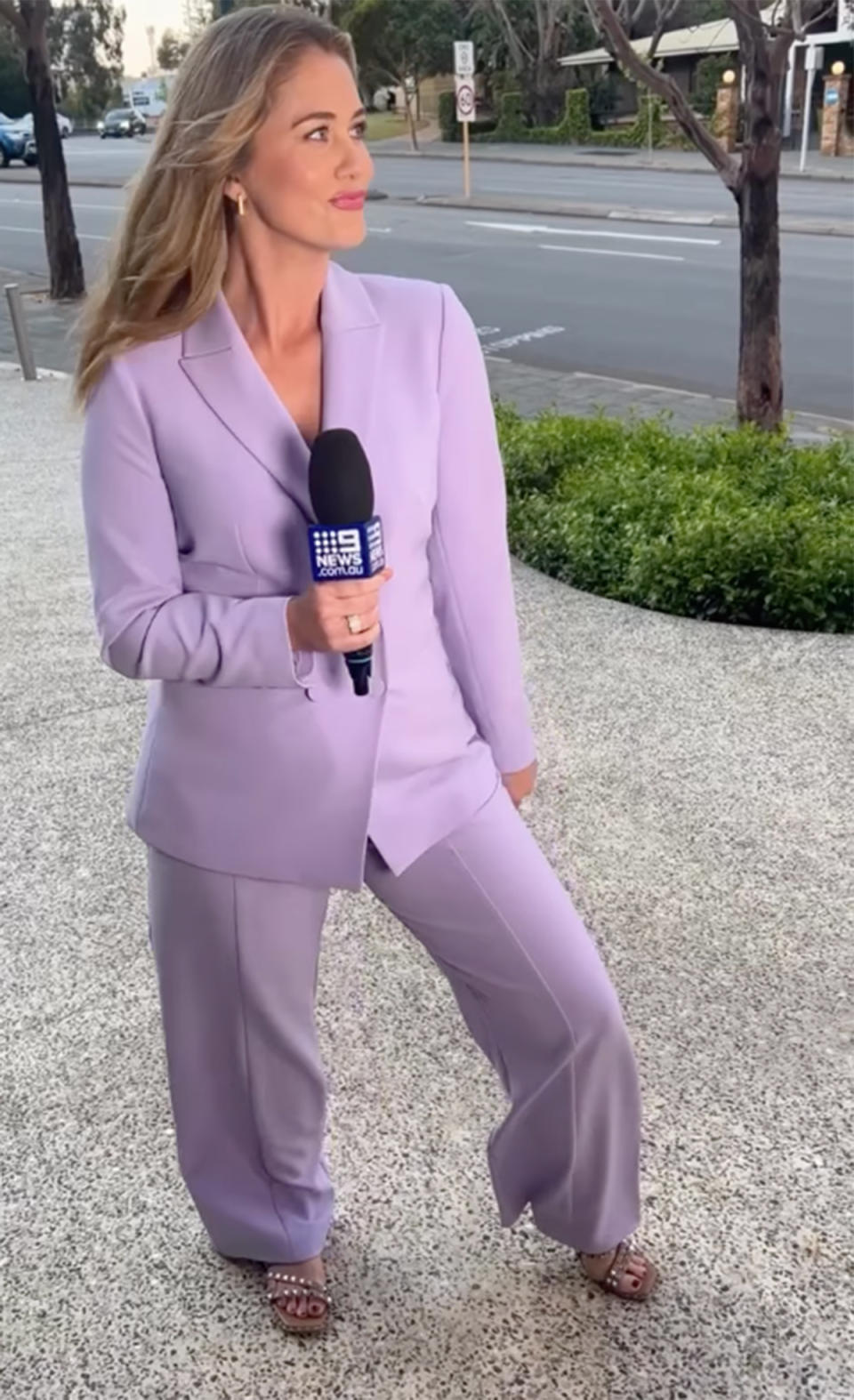 Scherri-Lee Biggs in a purple suit