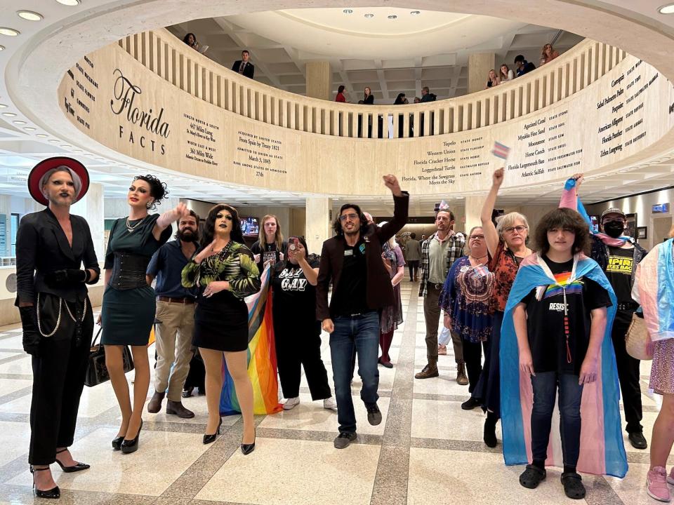 Demonstrators protest outside the Florida House chambers against bills the chamber passed on gender-transition treatments, bathroom use and keeping children out of drag shows, Wednesday April 19, 2023 in Tallahassee, Florida.
